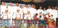 Karnataka State Handicrafts Manufacturers Association (KSHMA) felicitated 25 craftspersons (five of them are seen here) on May 1 at Jaganmohan Palace auditorium in city. They are seen with MLA Vasu, Mayor B.L.Bhyrappa, former Mayor P. Vishwanath, KSHMA President S. Ramu (fifth from left), Honorary President P. Gowaraiah (fourth from left), Senior Journalist N. Niranjan Nikam, Corporators R. Nagaraju, C. Ramesh & M.J. Ravikumar and others. 