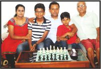 S.N. Jatin (sitting second from left) is seen with (from left) his parents Vani and Nagabhushan, younger brother S.N. Nitin and grandfather D.M. Nagesh. 