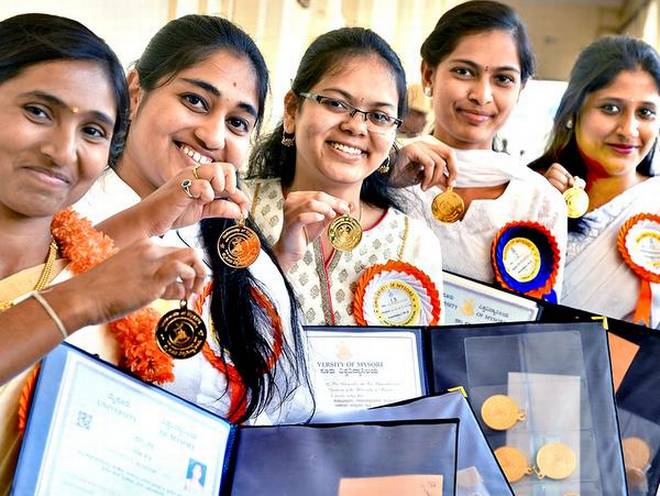 Proud moment:Gold medallists at the 98th convocation of the University of Mysore on Monday.M.A. SRIRAM 