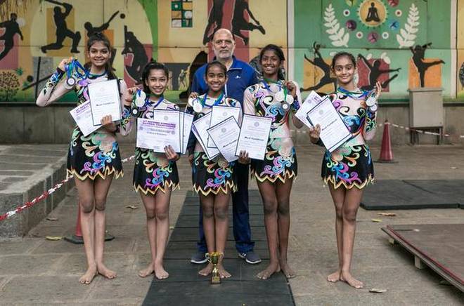 The State team that won two silver and one bronze medals at the 24th Rhythmic Gymnastics National Championship for Juniors and Seniors, which was held in Hyderabad recently. 