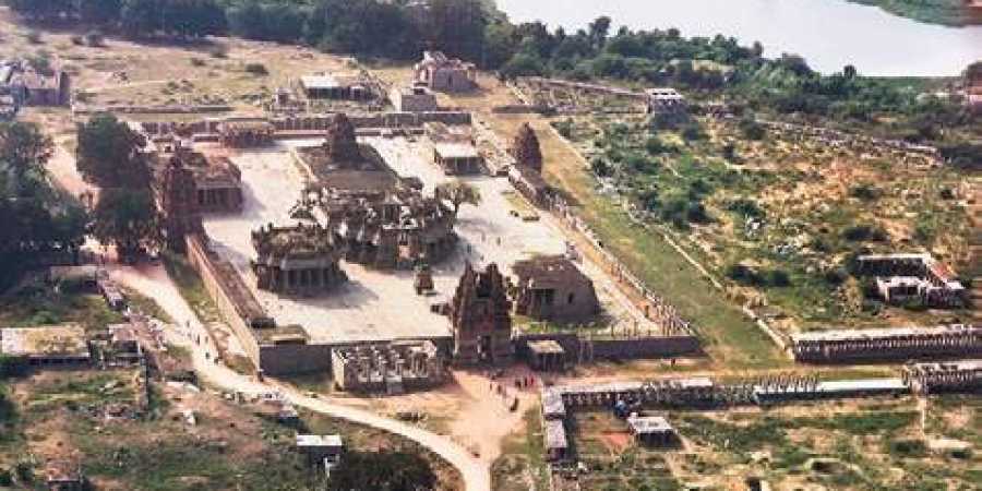 An aerial view of Vijaya Vittala temple complex on banks of the Tungabhadra River in Hampi; the famous stone chariot | Express