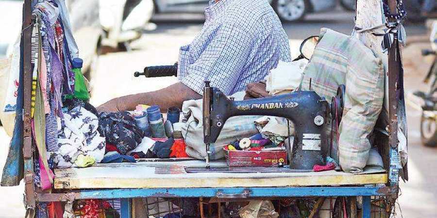 Sridhar Jayaram’s mobile tailoring facility now serves up to 400 commuters, helping him earn `1,000 a day  Pushkar V