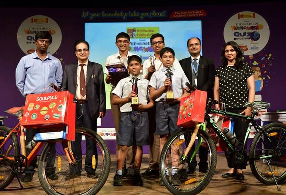 Juniors category winners Rohan Rajeev Bharadwaj, and Samir V. Murthy of Kumaran Children's Home CBSE, with Seniors category winnners Vishnu Ram Sampathkumar and Dhyan Vyas of National Public School, Indiranagar, with Inder Sain Baluja, General Manager, Syndicate Bank; Dheeraj Kumar, Regional Director, Aakash Educational Services Ltd.; Bhaskar, Area Sales Manager, Eveready Industries Ltd.; and Chaitra, Soulfull - South Brand Head. | Photo Credit: K. Murali Kumar