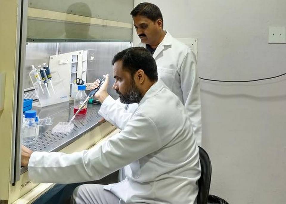 Higher uptake: Iodine forms a stronger halogen bond with the receptor, say Surendar Jakka (sitting) and Govindasamy Mugesh. 