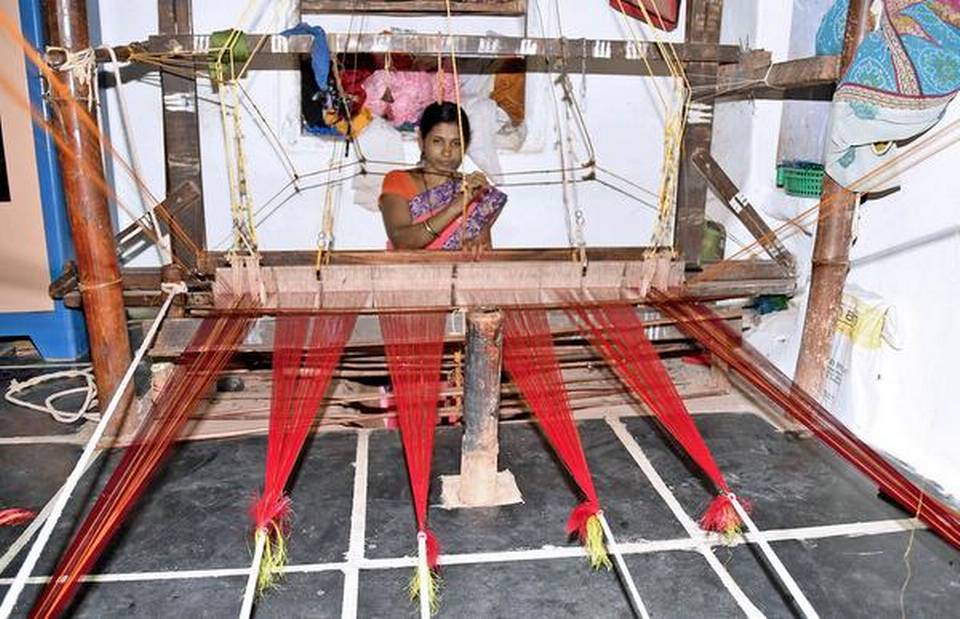 Lakshmi Sancholi (left) and Tirumala Palemari are among the many women who have taken to weaving to supplement the family income. 