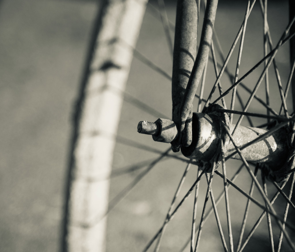 Metallic rings with spokes of a bicycle wheel unique stock photo