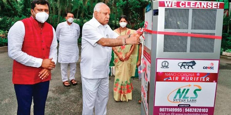 Chief Minister B S Yediyurappa inaugurates the Nano Corona Air Purifier-Cum-Steriliser at his official residence Krishna in Bengaluru on Friday